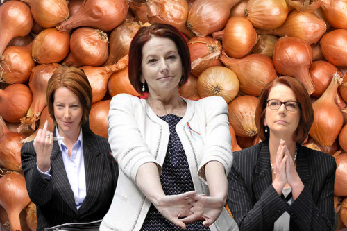 julia gillard stretching her arms out on a background of onions