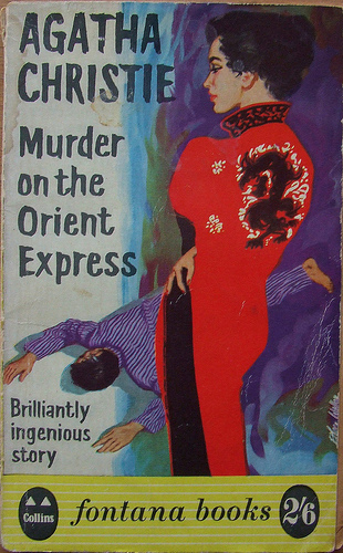 A rather racist cover for Murder on the Orient Express, depicting an Asian woman in a silk robe staring down at a corpse.