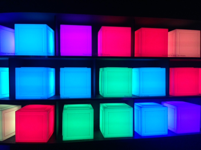 glowing boxes in a charging station